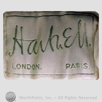 Clothing label : Norman Hartnell.