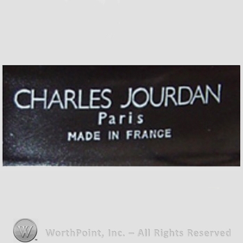 Clothing label : Charles Jourdan.