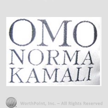 Clothing label : Norma Kamali.