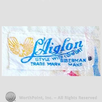 Clothing label : L'Aiglon.
