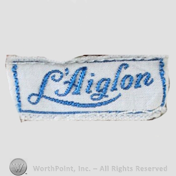 Clothing label : L'Aiglon.