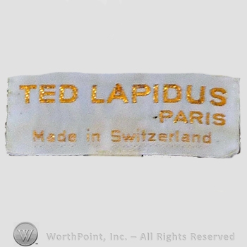 Clothing label : Ted Lapidus.