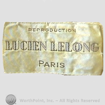 Clothing label : Lucien Lelong.