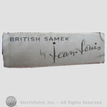 Clothing label : Jean Louis Berthault.