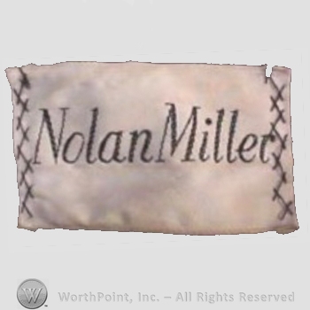 Clothing label : Nolan Miller.