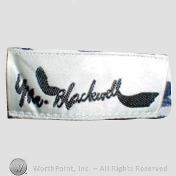 Clothing label : Mr. Blackwell.