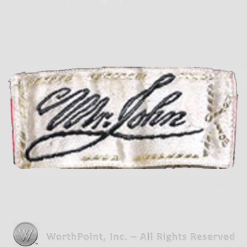 Clothing label : Mr. John.