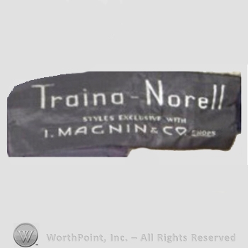 Clothing label : Norman Norell.