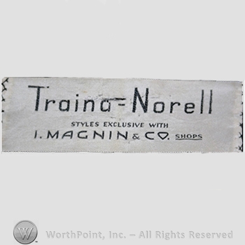 Clothing label : Norman Norell.