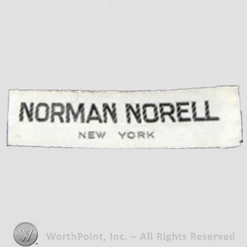 Clothing label : Norman Norell.