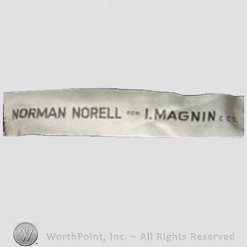 Clothing label : Norman Norell.