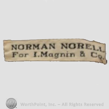 Clothing label : Norman Norell.