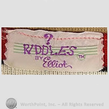 Clothing label : Novelty Label. Riddles by Elliot.