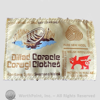 Clothing label : Novelty Label. Daillad Corwgi Coracle Clothet.