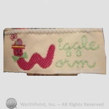 Clothing label : Novelty Label. Wiggle Worm.