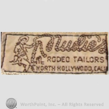 Clothing label : Nudie Cohn.
