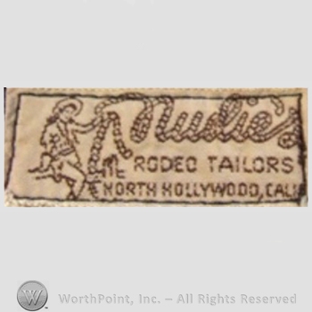 Clothing label : Nudie Cohn.