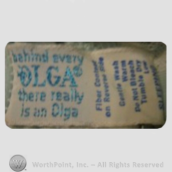 Clothing label : Olga Erteszek.