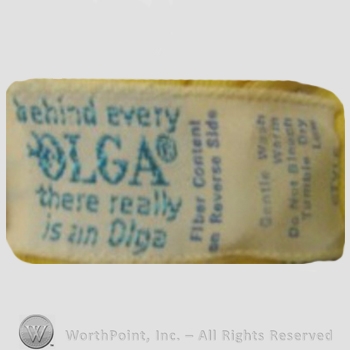 Clothing label : Olga Erteszek.