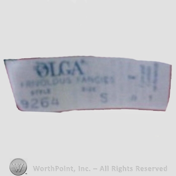 Clothing label : Olga Erteszek.