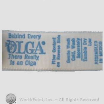 Clothing label : Olga Erteszek.