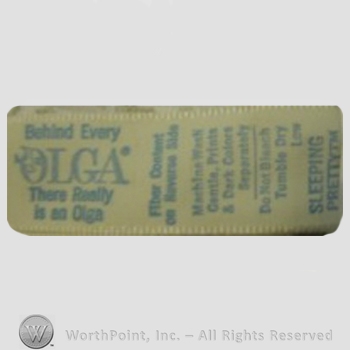 Clothing label : Olga Erteszek.