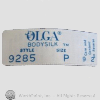 Clothing label : Olga Erteszek.