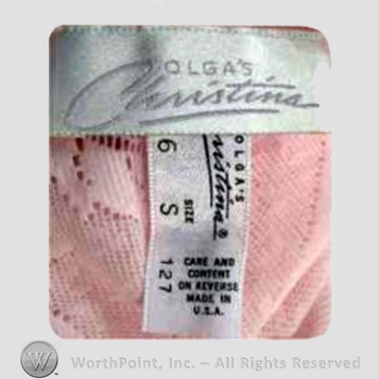 Clothing label : Olga Erteszek.