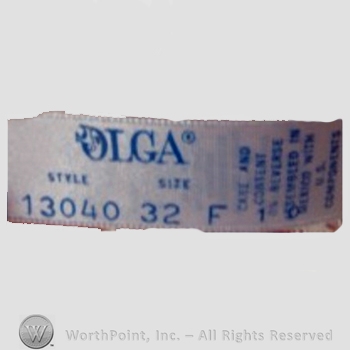 Clothing label : Olga Erteszek.
