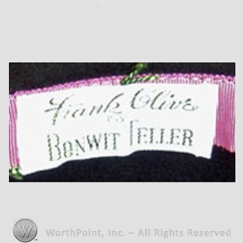 Clothing label : Frank Olive.
