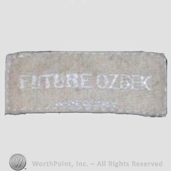 Clothing label : Rifat Ozbeck.