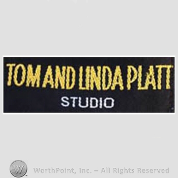 Clothing label : Tom and Linda Platt.