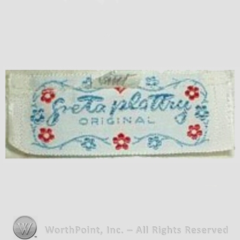 Clothing label : Greta Plattry.