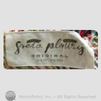 Clothing label : Greta Plattry.