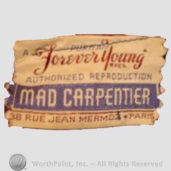 Clothing label : Puritan Dress Company.