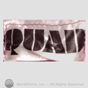 Clothing label : Quad.