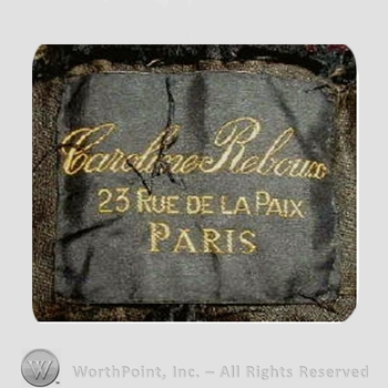 Clothing label : Caroline Reboux.