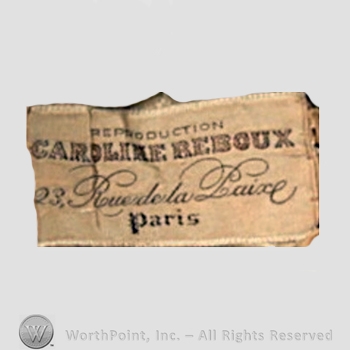 Clothing label : Caroline Reboux.