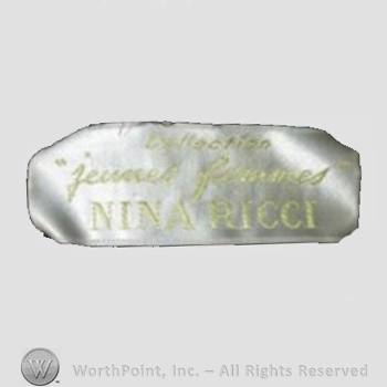 Clothing label : Nina Ricci.