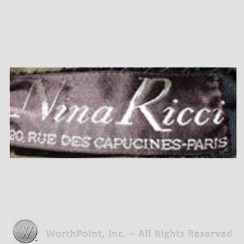 Clothing label : Nina Ricci.