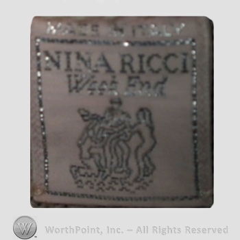 Clothing label : Nina Ricci.