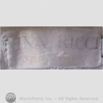 Clothing label : Nina Ricci.