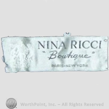 Clothing label : Nina Ricci.