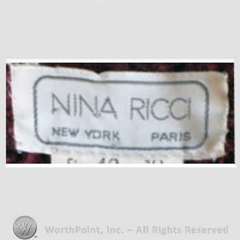 Clothing label : Nina Ricci.