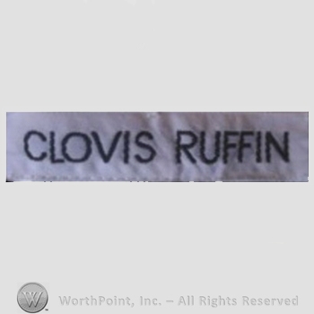 Clothing label : Clovis Ruffin.