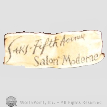 Clothing label : Saks Fifth Avenue.