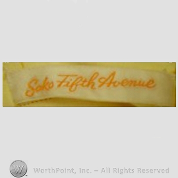 Clothing label : Saks Fifth Avenue.