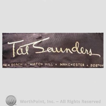 Clothing label : Tat Saunders.