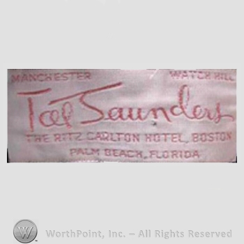 Clothing label : Tat Saunders.
