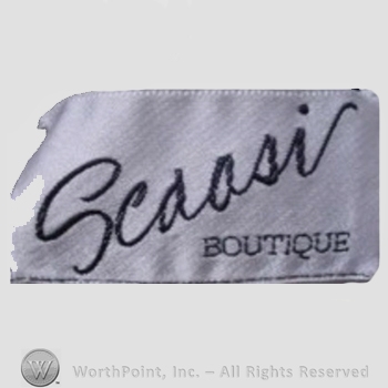 Clothing label : Arnold Scaasi.